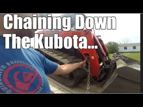 dot how to properly chain down a skid steer|how to see a dot tie down.